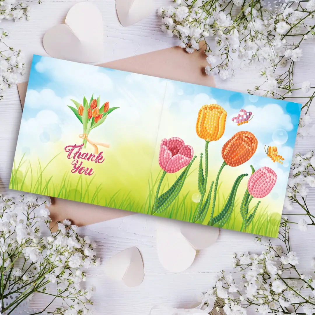 Diamond painting wenskaart met de tekst 'Thank you' en tulpen in een veld